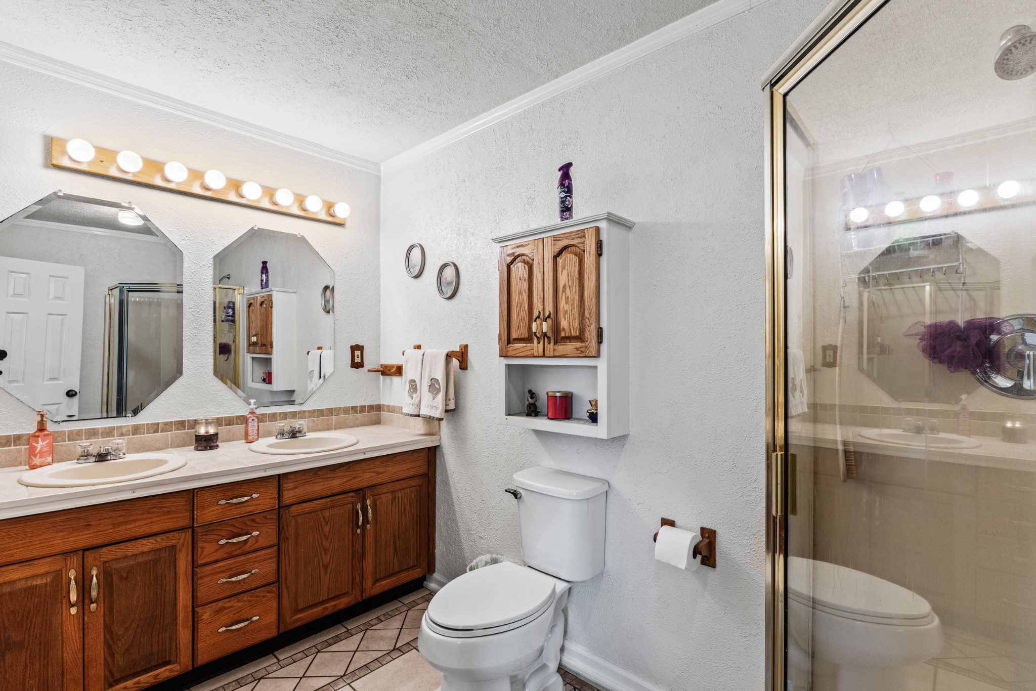 300 Wright Road Prospect, TN 38477 - Photo 40 of 65 a spacious bathroom with a toilet a sink and a large mirror