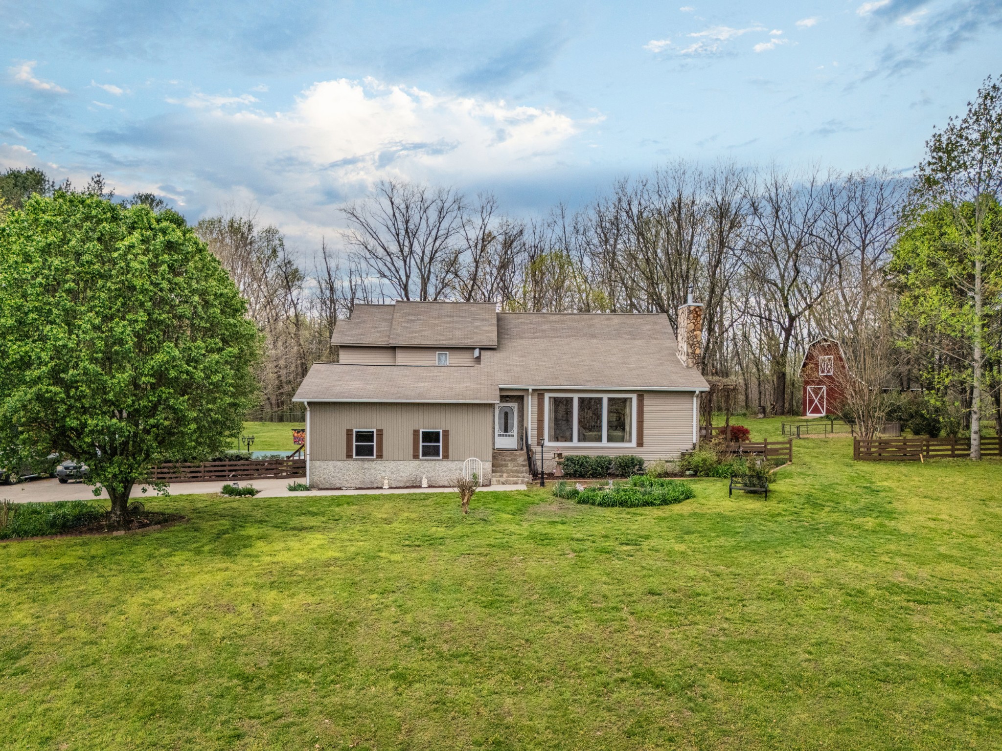 300 Wright Road Prospect, TN 38477 - Photo 5 of 65 a view of house with a big yard and large trees