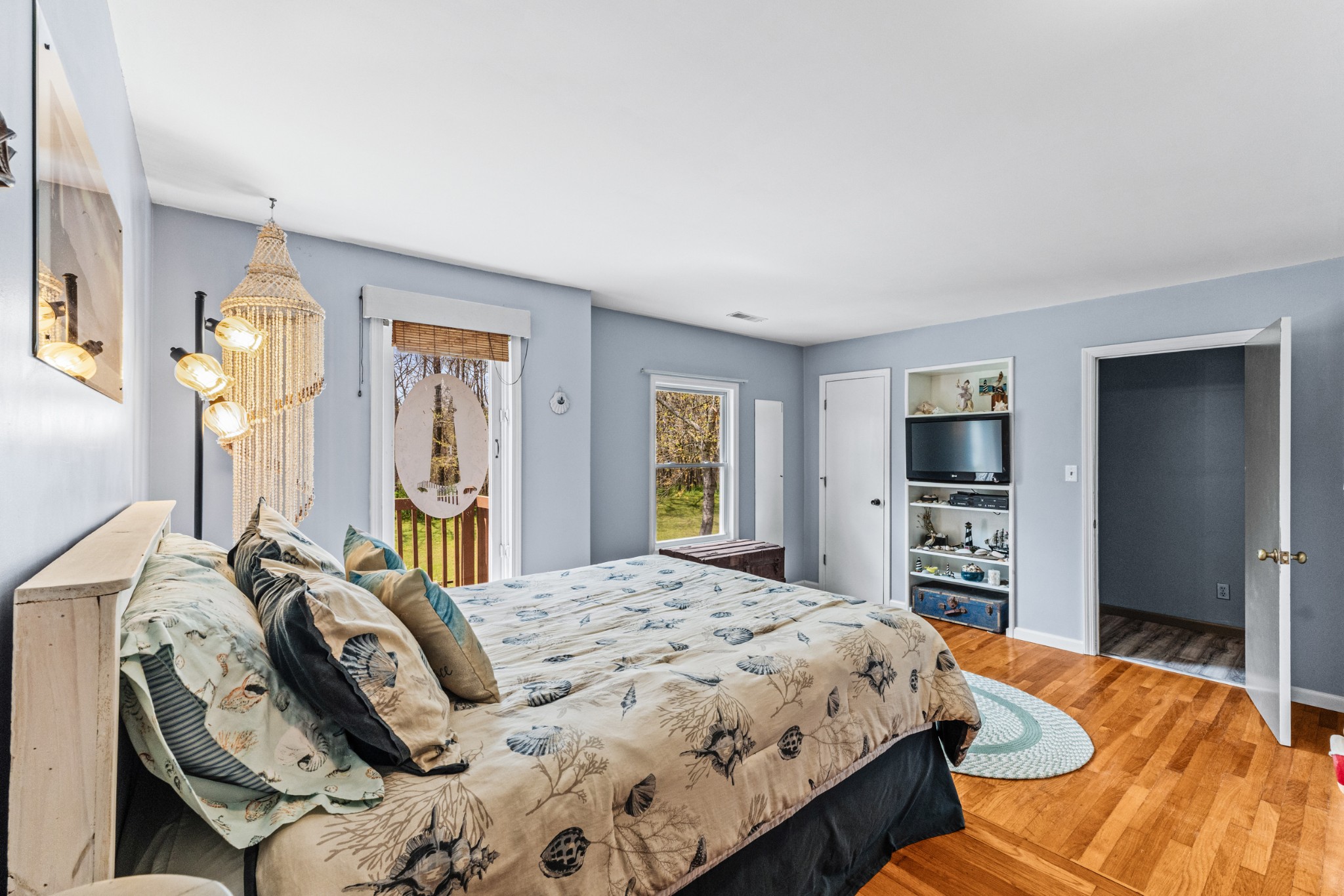 300 Wright Road Prospect, TN 38477 - Photo 52 of 65 a bedroom with a bed and a flat screen tv