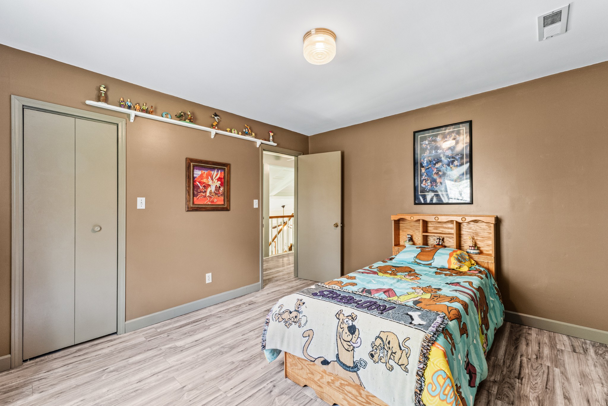 300 Wright Road Prospect, TN 38477 - Photo 55 of 65 a bedroom with a bed and wooden floor