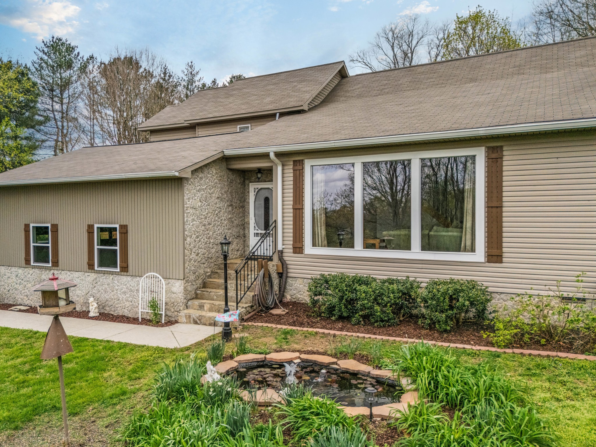 300 Wright Road Prospect, TN 38477 - Photo 6 of 65 a house view with a garden space
