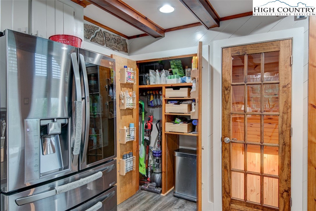 314 Sutherland Road Creston, NC 28615 - Photo 11 of 50 a view of walk in closet with clothes and shoes