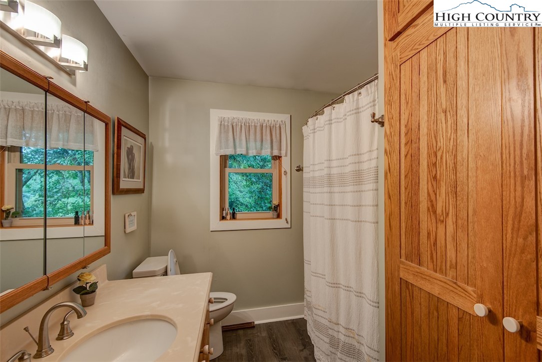 314 Sutherland Road Creston, NC 28615 - Photo 19 of 50 a bathroom with a sink and a tub