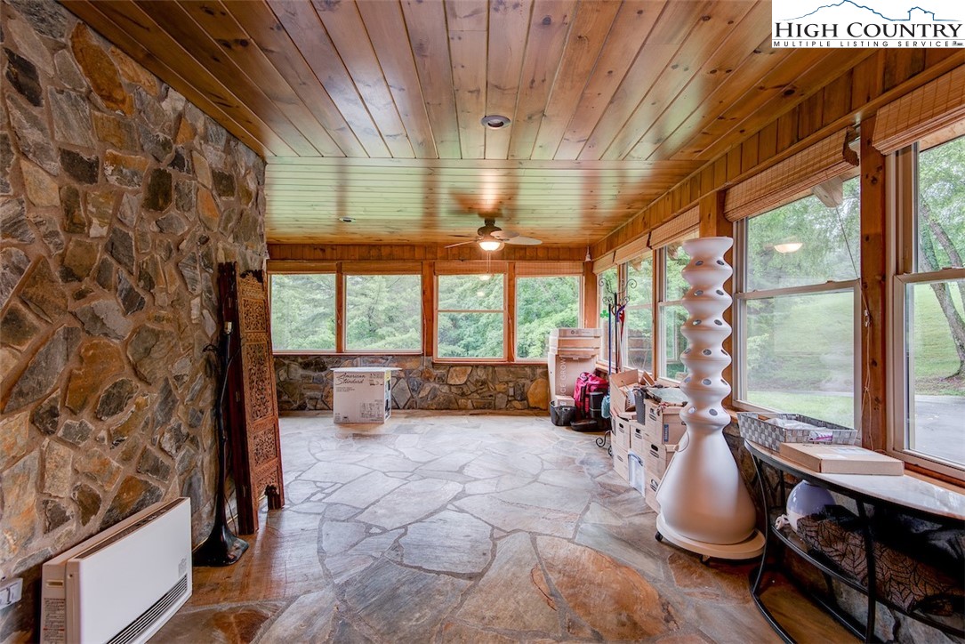 314 Sutherland Road Creston, NC 28615 - Photo 22 of 50 a lobby with furniture and floor to ceiling window