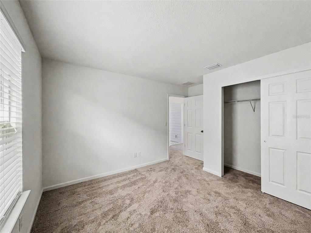 55 Signet Circle Flagler Beach, FL 32136 - Photo 29 of 39 an empty room with a natural light