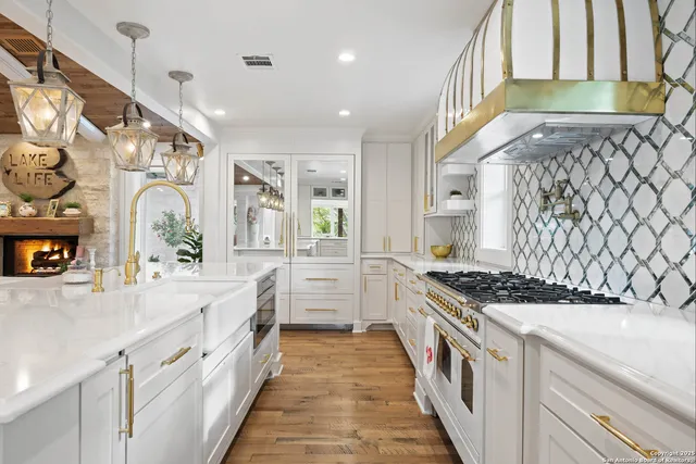 a utility room with dryer and next to a window