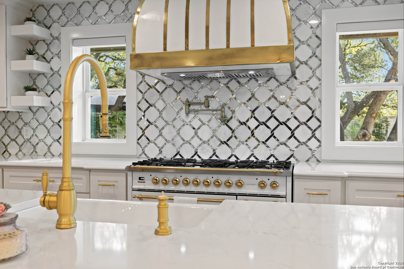 1310 Oak Springs Road Kingsland, TX 78639 - Photo 17 of 49 a utility room with dryer and next to a window