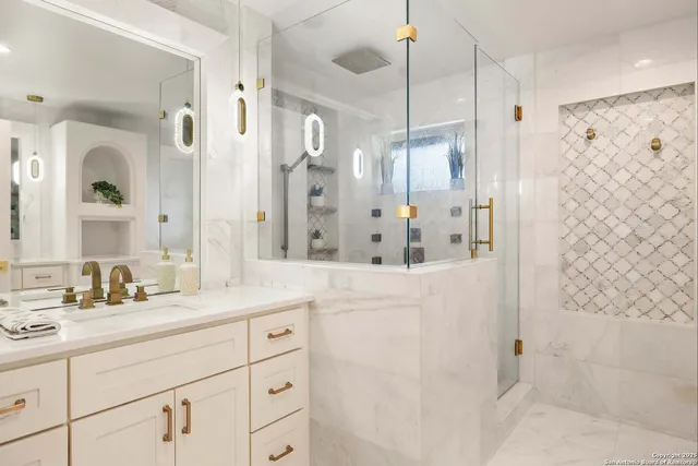 a bathroom with a shower sink and mirror