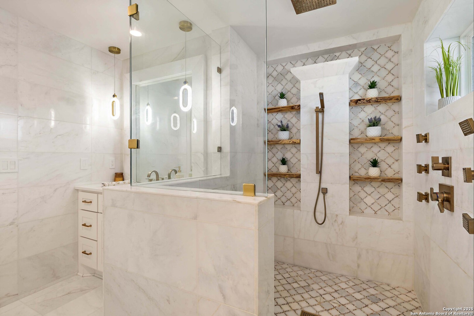 1310 Oak Springs Road Kingsland, TX 78639 - Photo 23 of 49 a bathroom with a shower sink and mirror