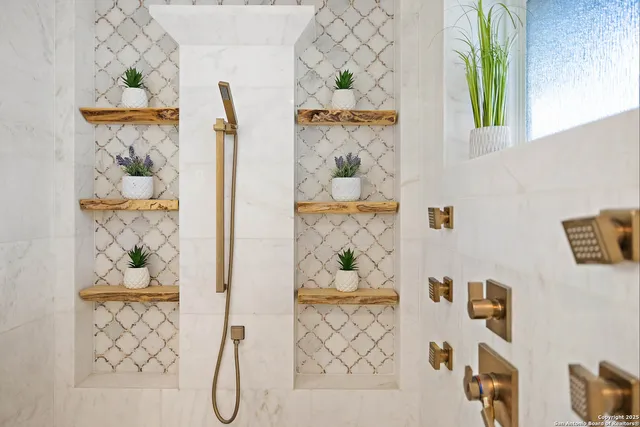 a bathroom with a sink a vanity and a mirror
