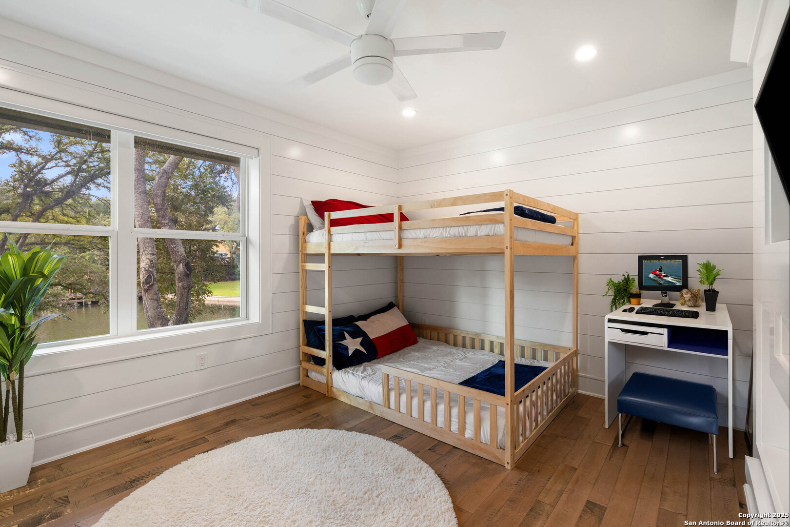 1310 Oak Springs Road Kingsland, TX 78639 - Photo 26 of 49 a living room with furniture and a window