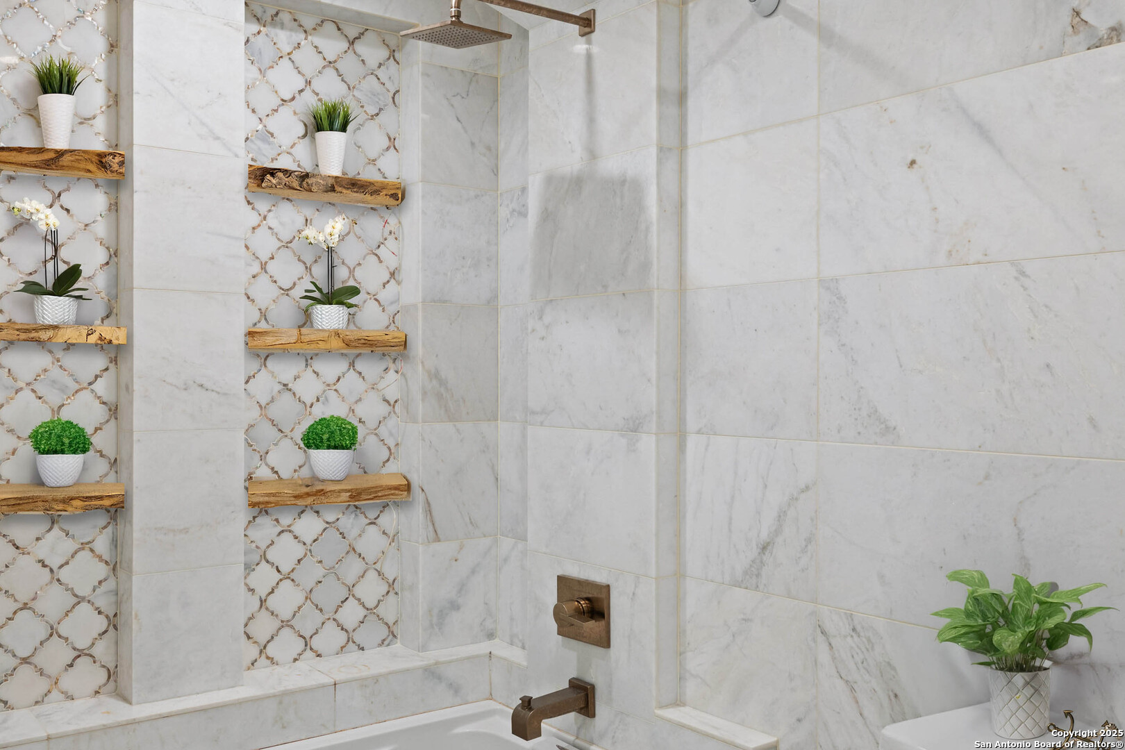 1310 Oak Springs Road Kingsland, TX 78639 - Photo 28 of 49 a bath tub sitting in a bathroom with a vase of flowers