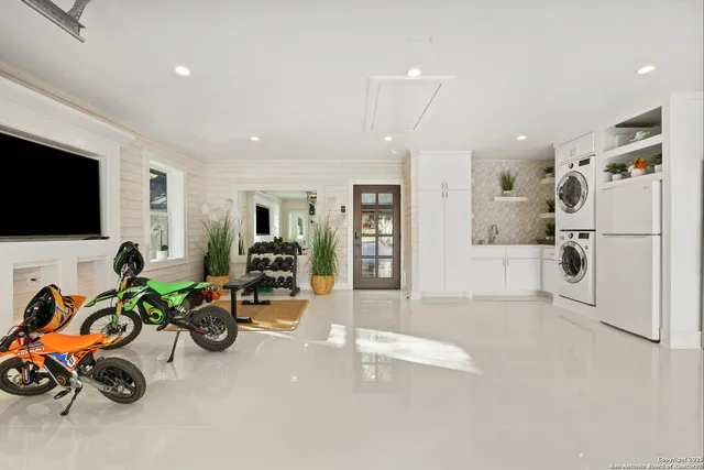 a view of a storage & utility room with a washer and dryer