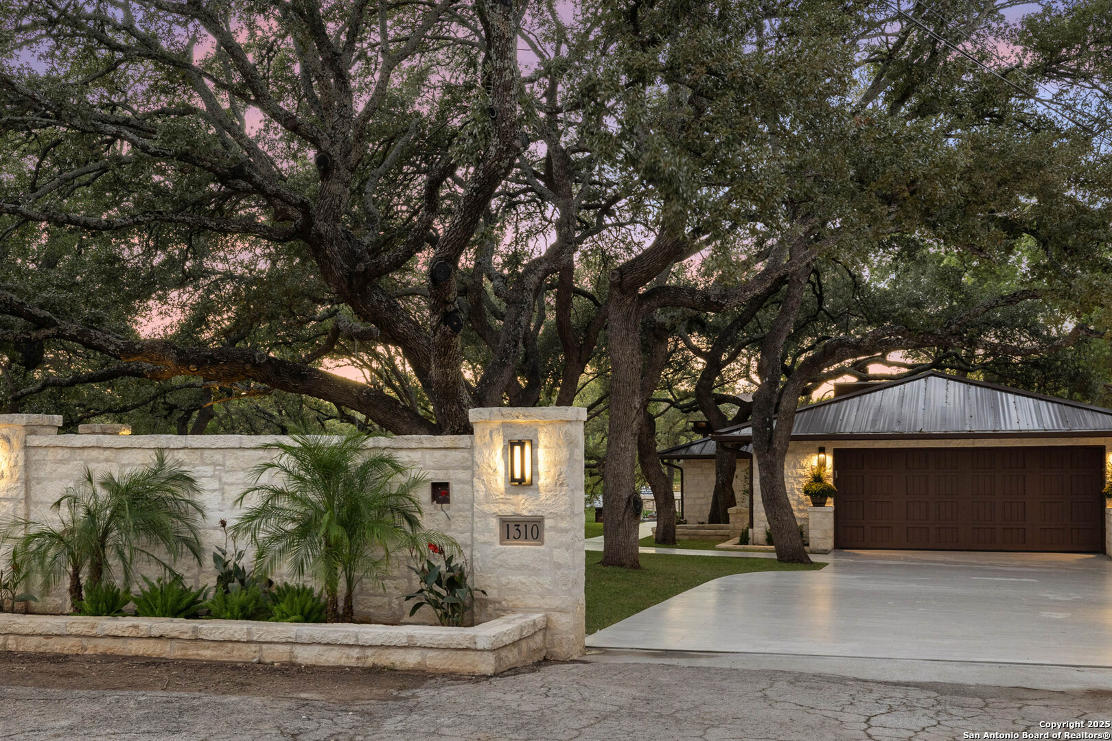 1310 Oak Springs Road Kingsland, TX 78639 - Photo 48 of 49 a front view of a house with a yard