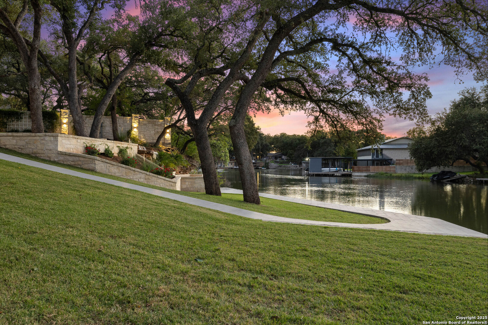 1310 Oak Springs Road Kingsland, TX 78639 - Photo 6 of 49 a swimming pool with outdoor seating and yard