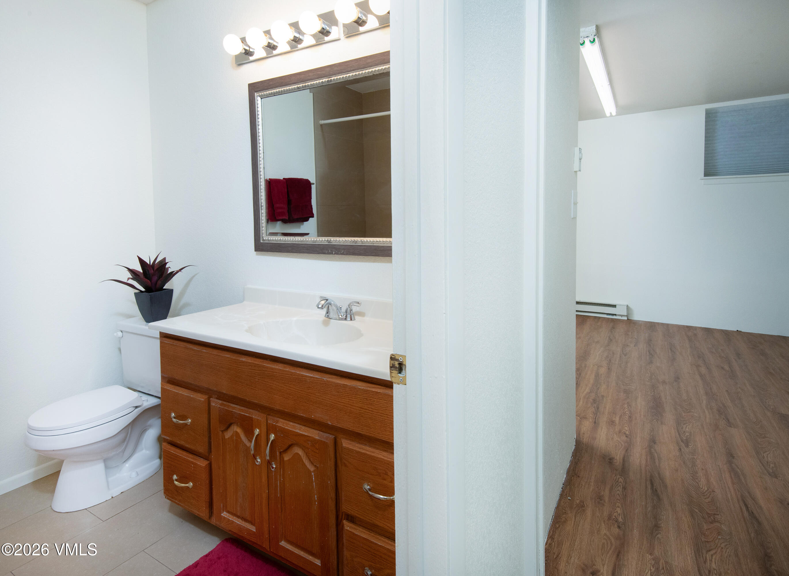 85 Chambers Avenue, Unit 10 Eagle, CO 81631 - Photo 23 of 41 a bathroom with a sink and a toilet