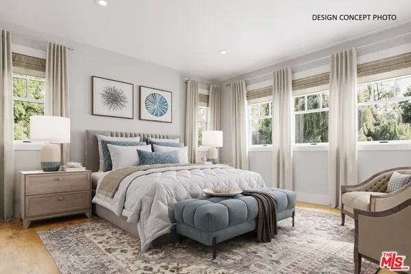 a bedroom with a bed and glass window