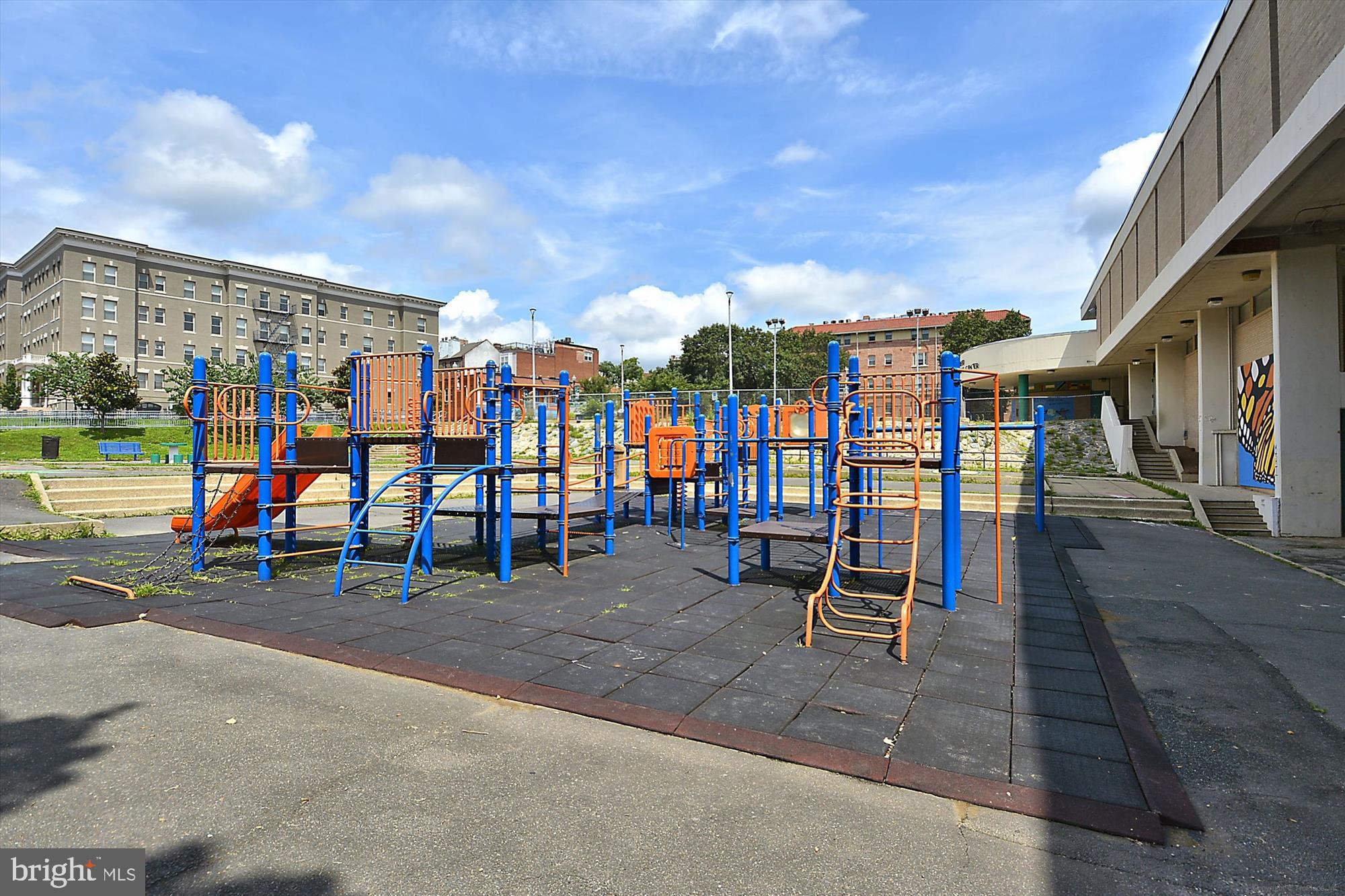1114 Spring Road Northwest Washington, DC 20010 - Photo 124 of 142 a view of a park with swings and slides