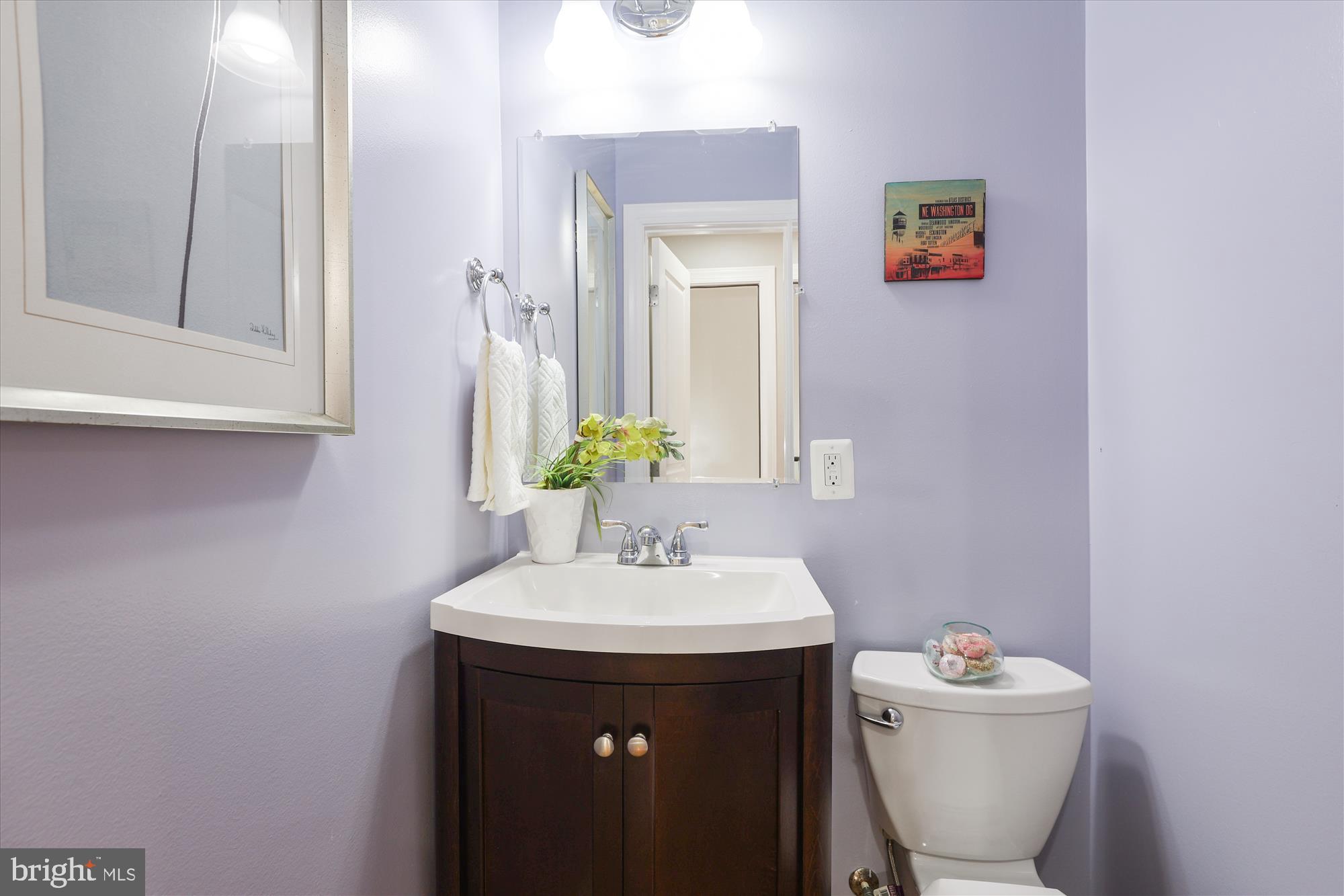 1114 Spring Road Northwest Washington, DC 20010 - Photo 19 of 142 a bathroom with a sink and a toilet