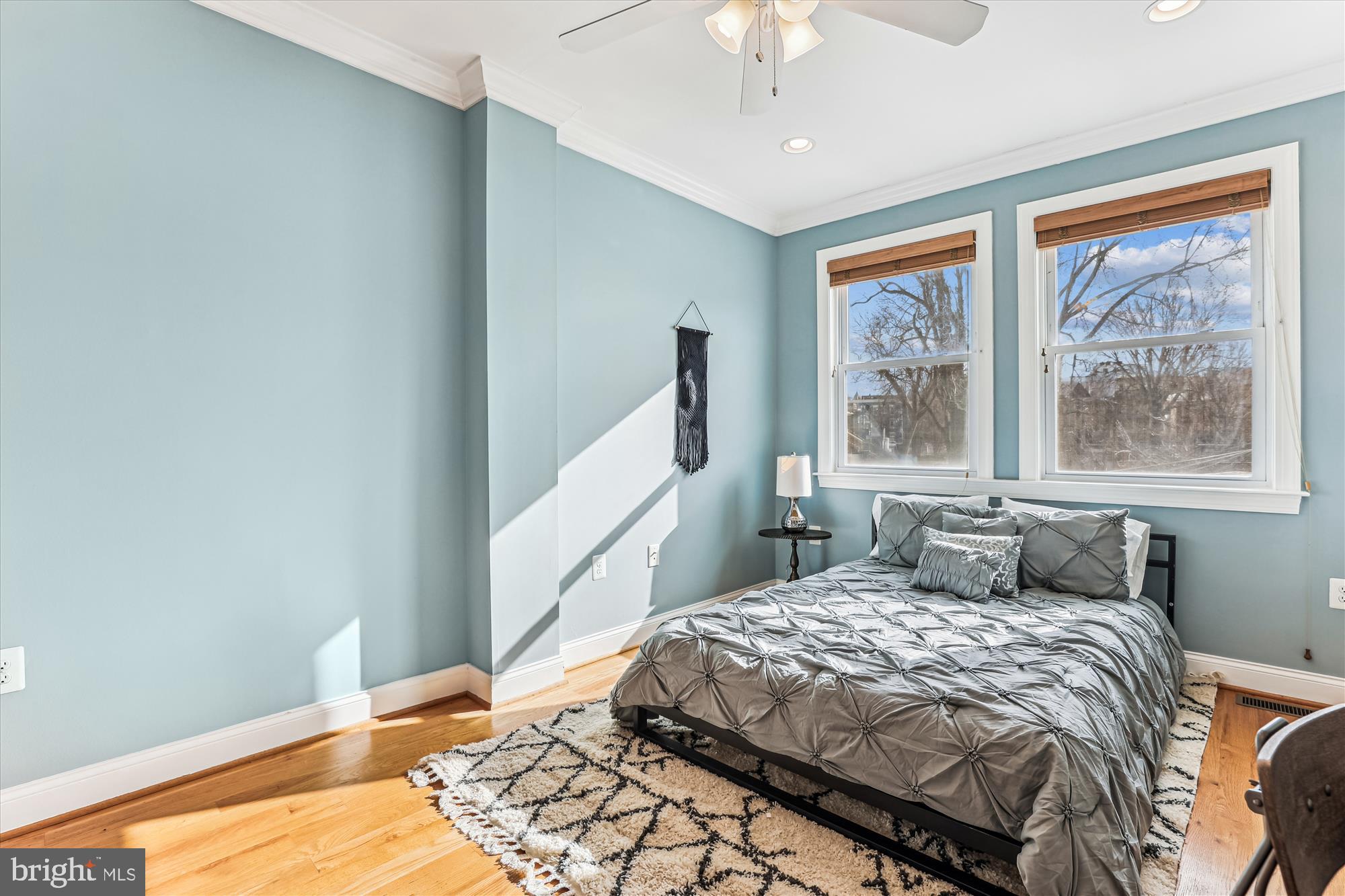 1114 Spring Road Northwest Washington, DC 20010 - Photo 33 of 142 a bedroom with a large bed and a window