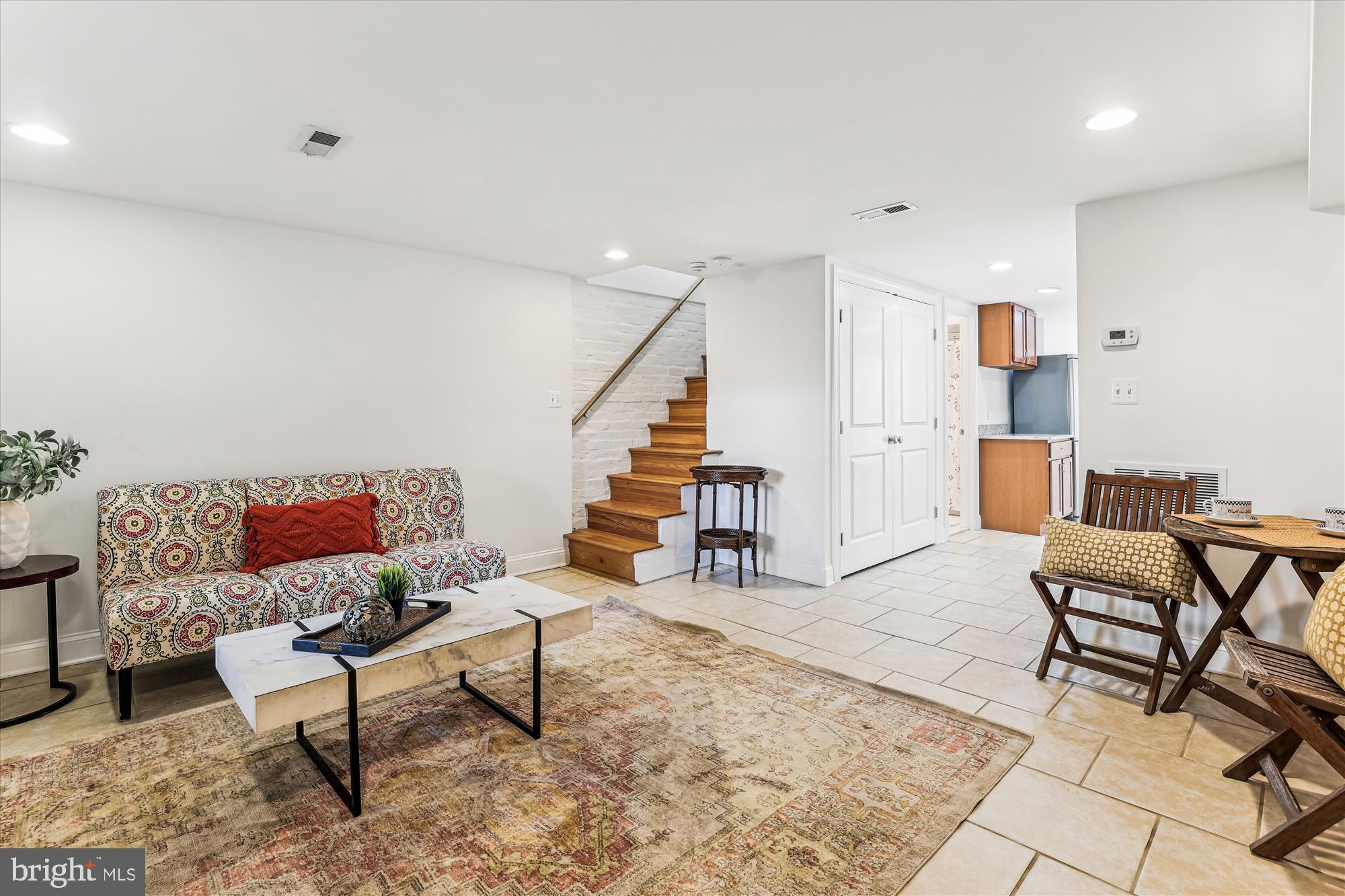 1114 Spring Road Northwest Washington, DC 20010 - Photo 43 of 142 a living room with furniture and wooden floor