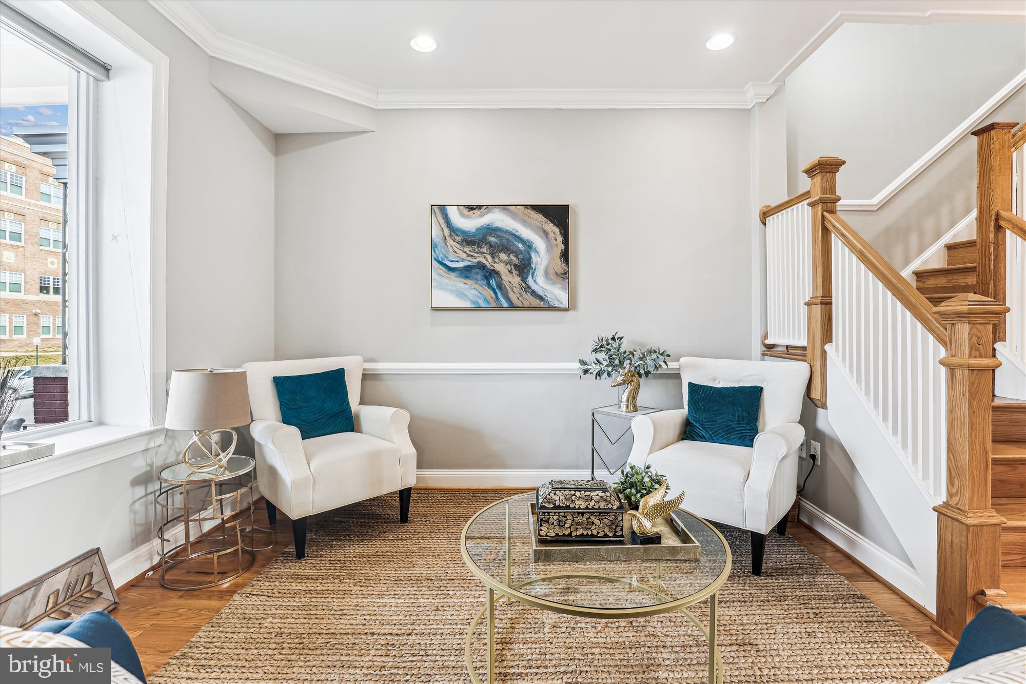 1114 Spring Road Northwest Washington, DC 20010 - Photo 5 of 142 a living room with furniture and white walls