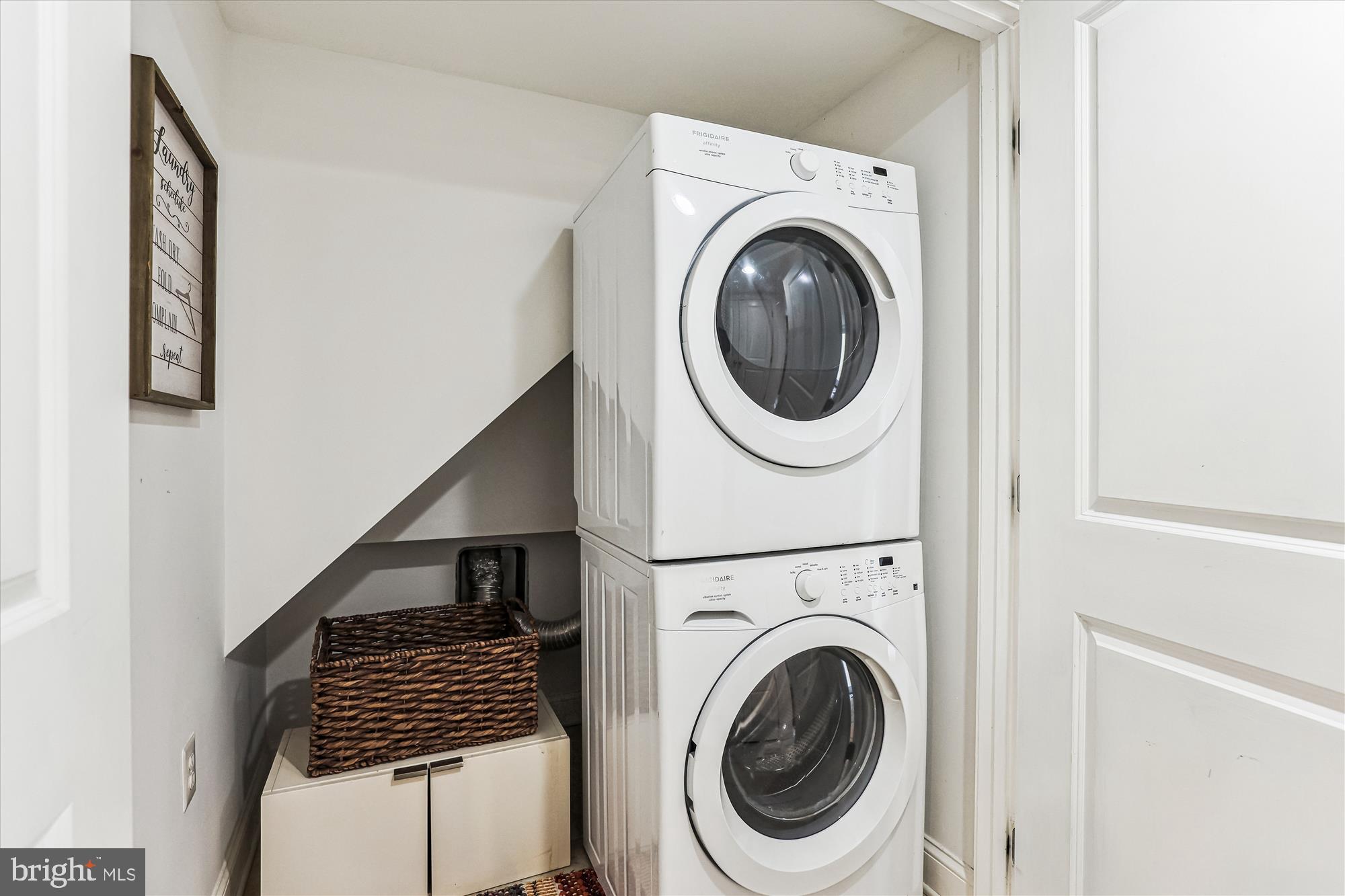 1114 Spring Road Northwest Washington, DC 20010 - Photo 54 of 142 a view of a hallway with washer and dryer