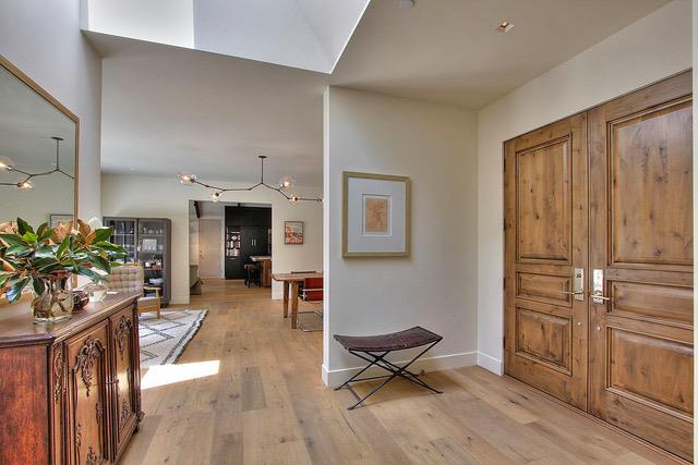Undisclosed Address Atherton, CA 94027 - Photo 3 of 30 a living room with furniture a wooden floor and a potted plant
