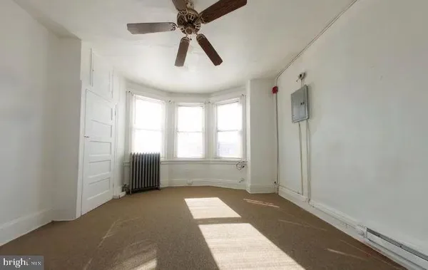 a view of hallway with windows