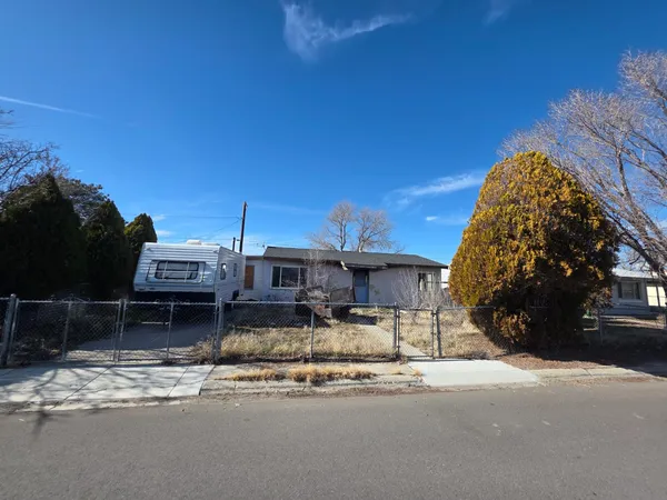 a view of a street with cars on road
