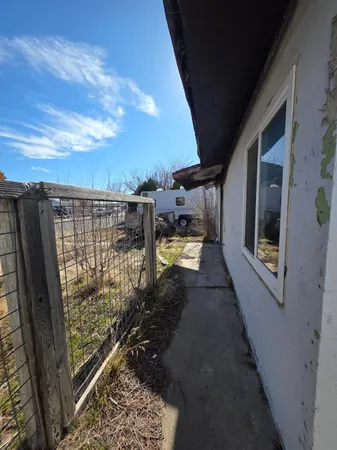 a view of a kitchen with a sink