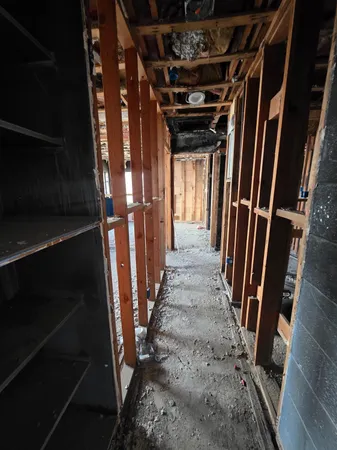 a view of a porch with furniture and a window
