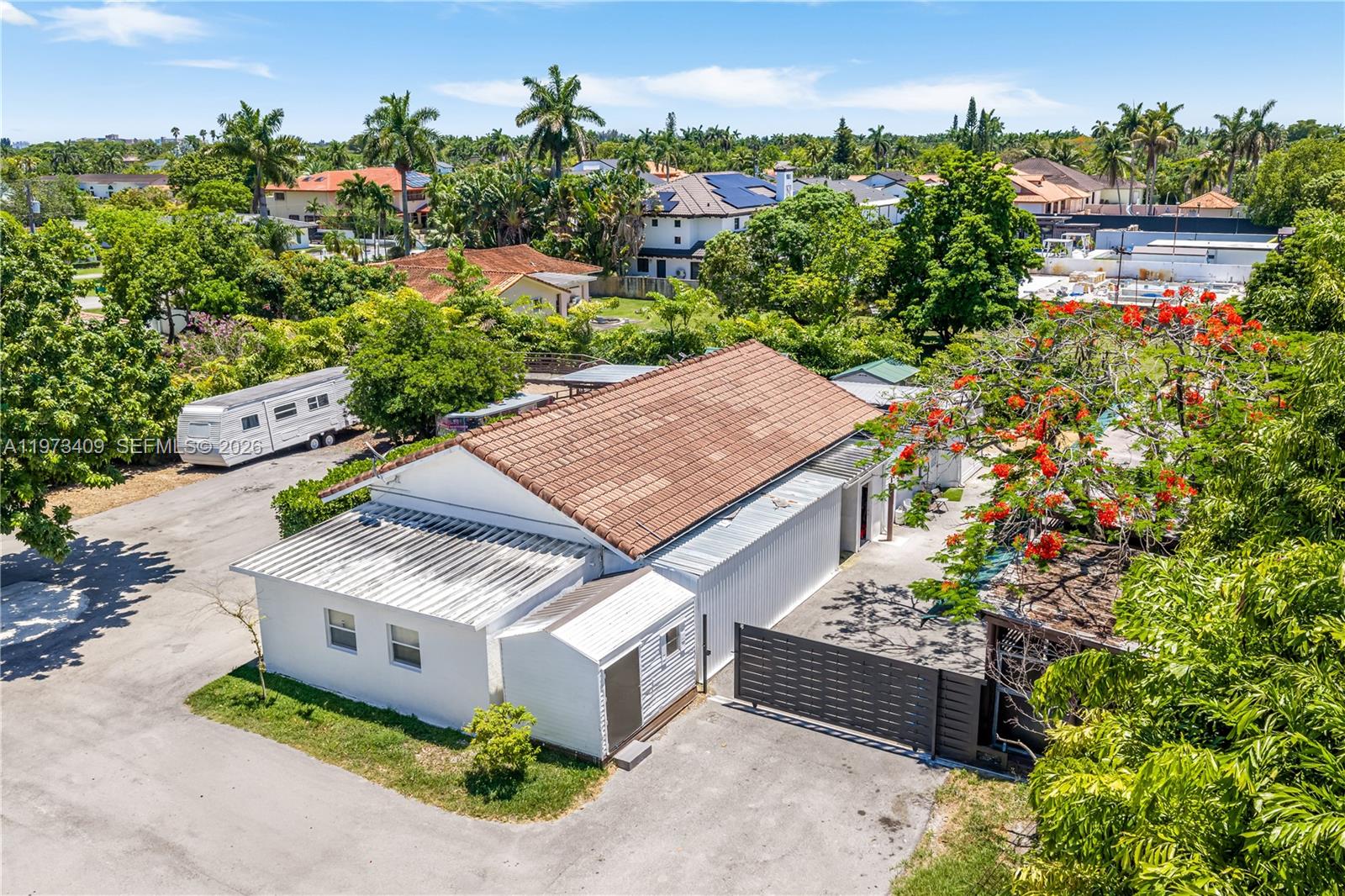 13050 Southwest 26th Street Miami, FL 33175 - Photo 41 of 43 an aerial view of a house with a yard