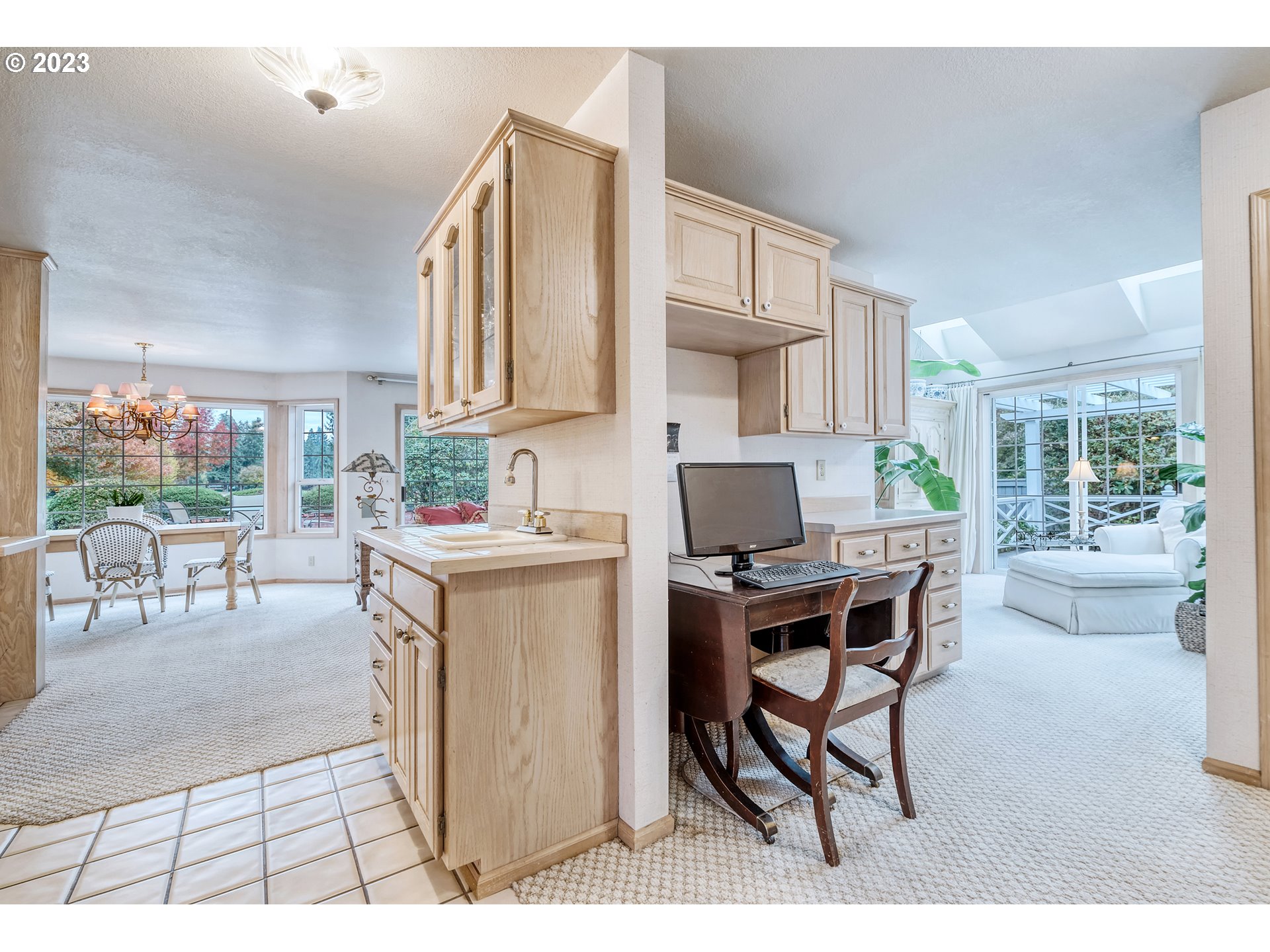 849 Fairway View Drive Eugene, OR 97401 - Photo 20 of 47 a work place with a large window and a dining table