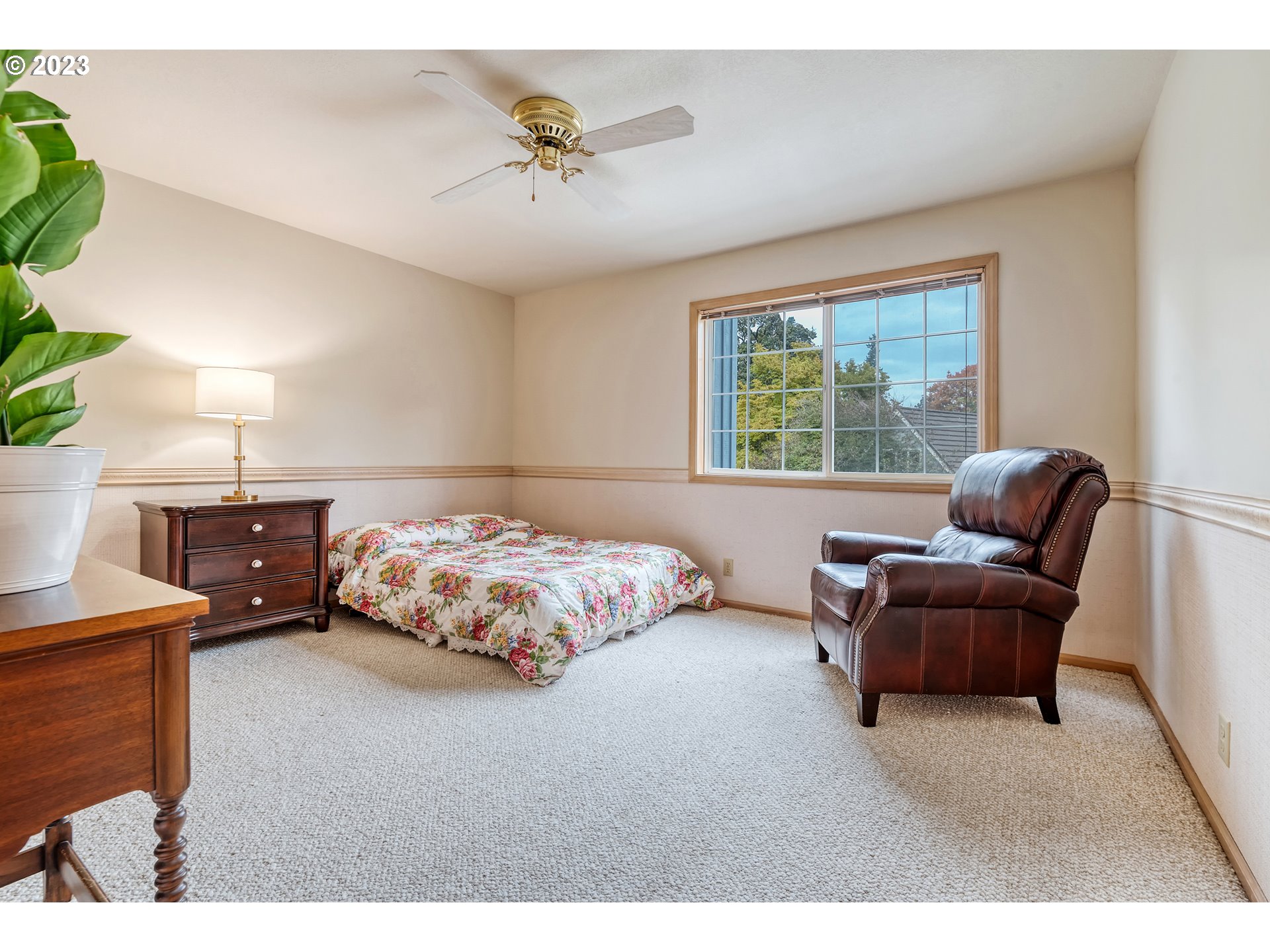 849 Fairway View Drive Eugene, OR 97401 - Photo 34 of 47 a bedroom with furniture and a large window