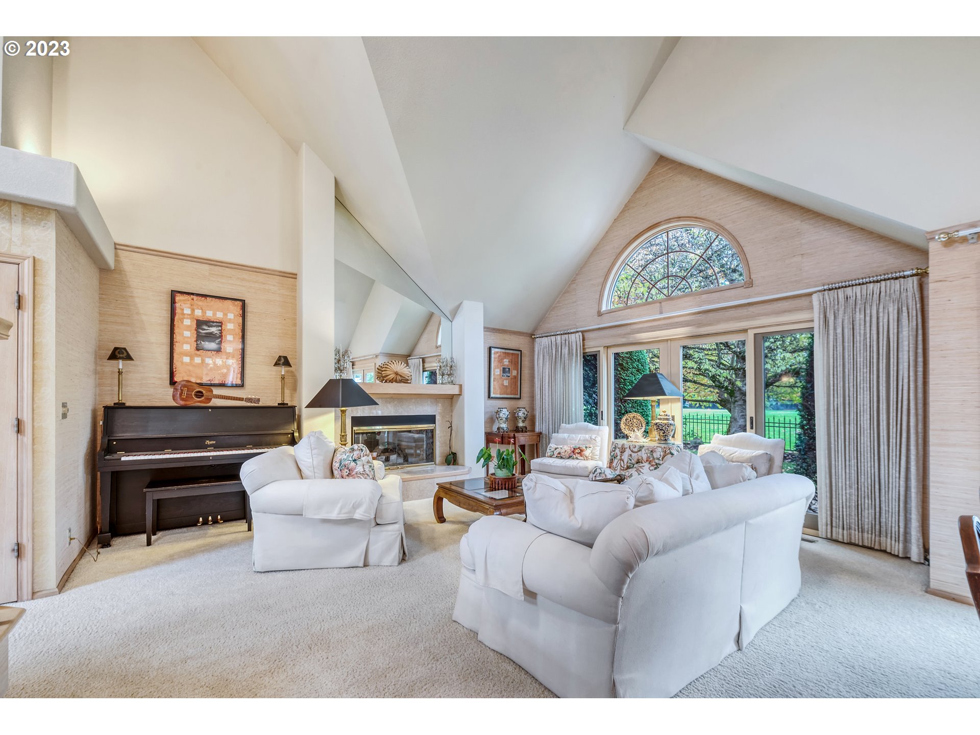 849 Fairway View Drive Eugene, OR 97401 - Photo 7 of 47 a living room with furniture a fireplace and a large window