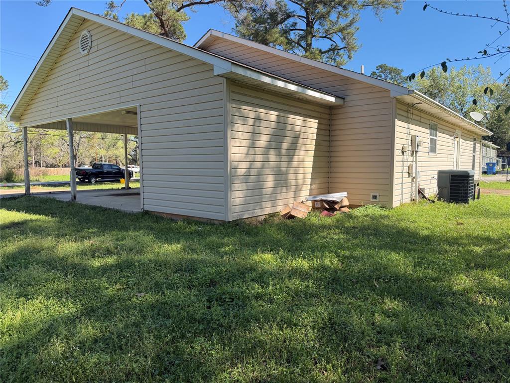 2502 Davisville Road Lufkin, TX 75901 - Photo 26 of 30 a view of a house with a yard and sitting area