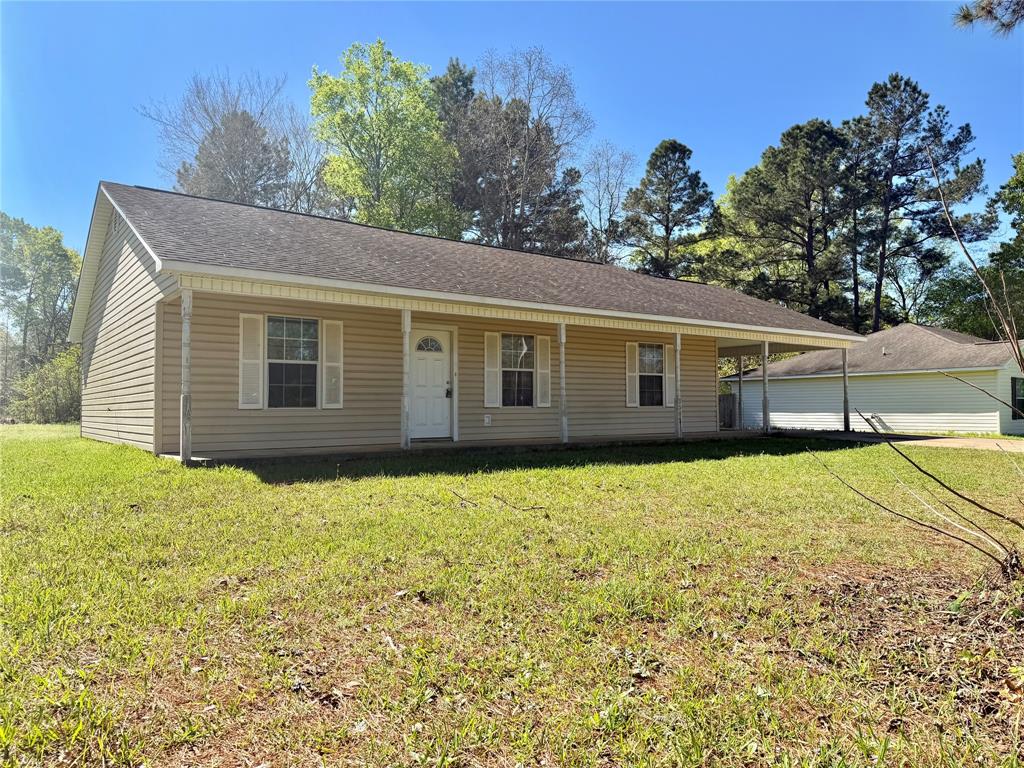 2502 Davisville Road Lufkin, TX 75901 - Photo 5 of 30 a backyard of a house
