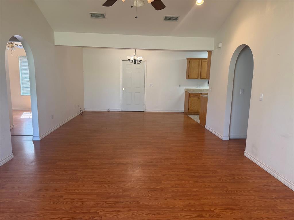 2502 Davisville Road Lufkin, TX 75901 - Photo 7 of 30 a view of a kitchen with a sink and refrigerator