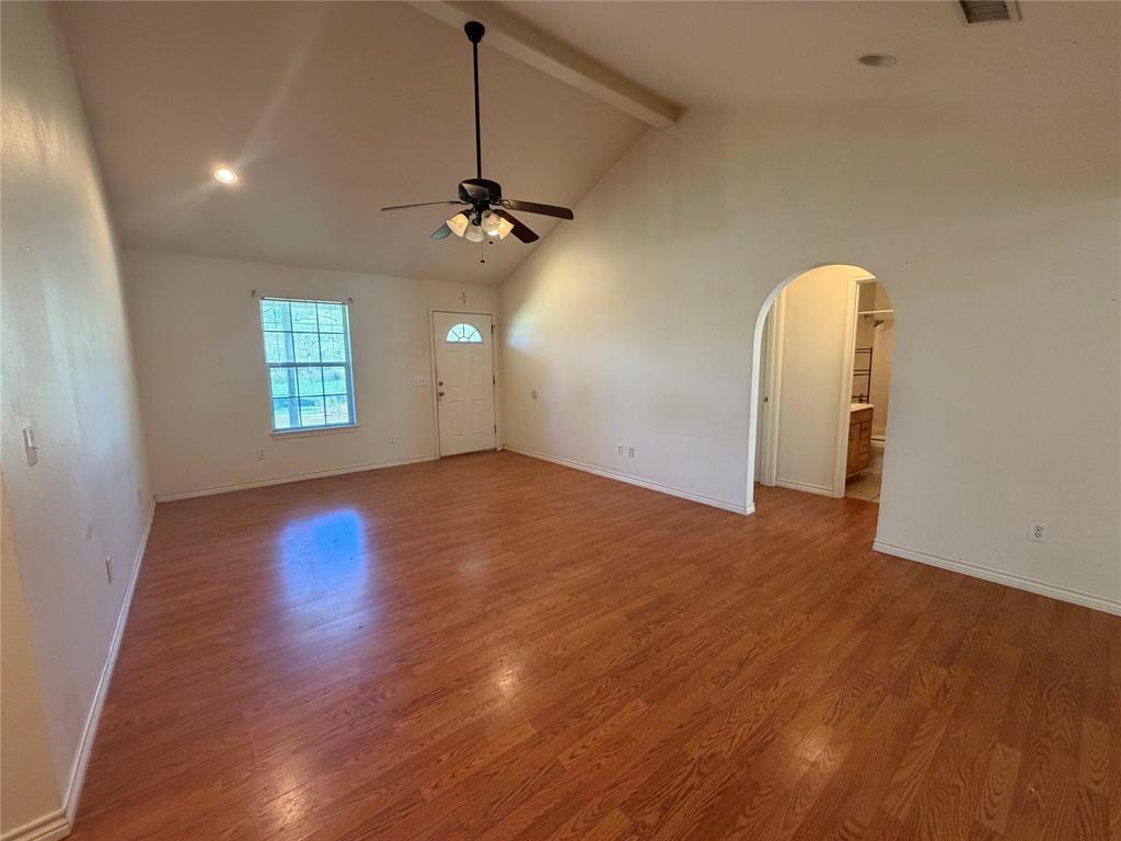 2502 Davisville Road Lufkin, TX 75901 - Photo 8 of 30 a view of a room with window and wooden floor