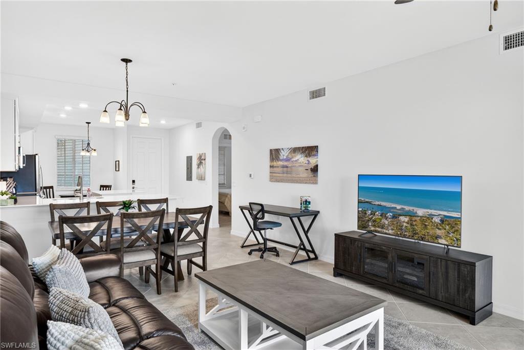 43985 Boardwalk Loop, Unit 2115 Punta Gorda, FL 33982 - Photo 9 of 28 a view of a a dining room with furniture window and outside view