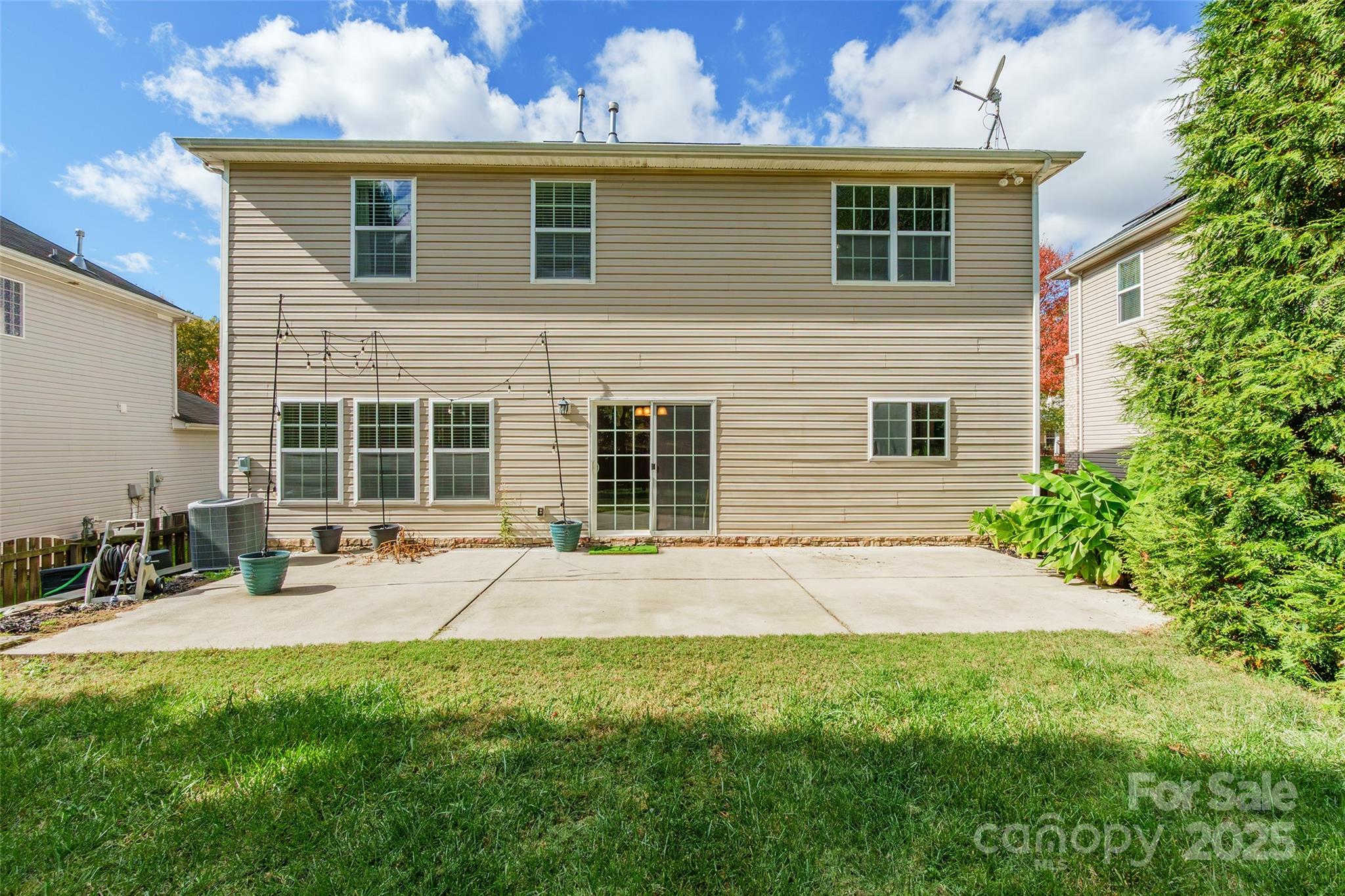 9312 Seamill Road Charlotte, NC 28278 - Photo 28 of 30 a front view of a house with yard and seating space