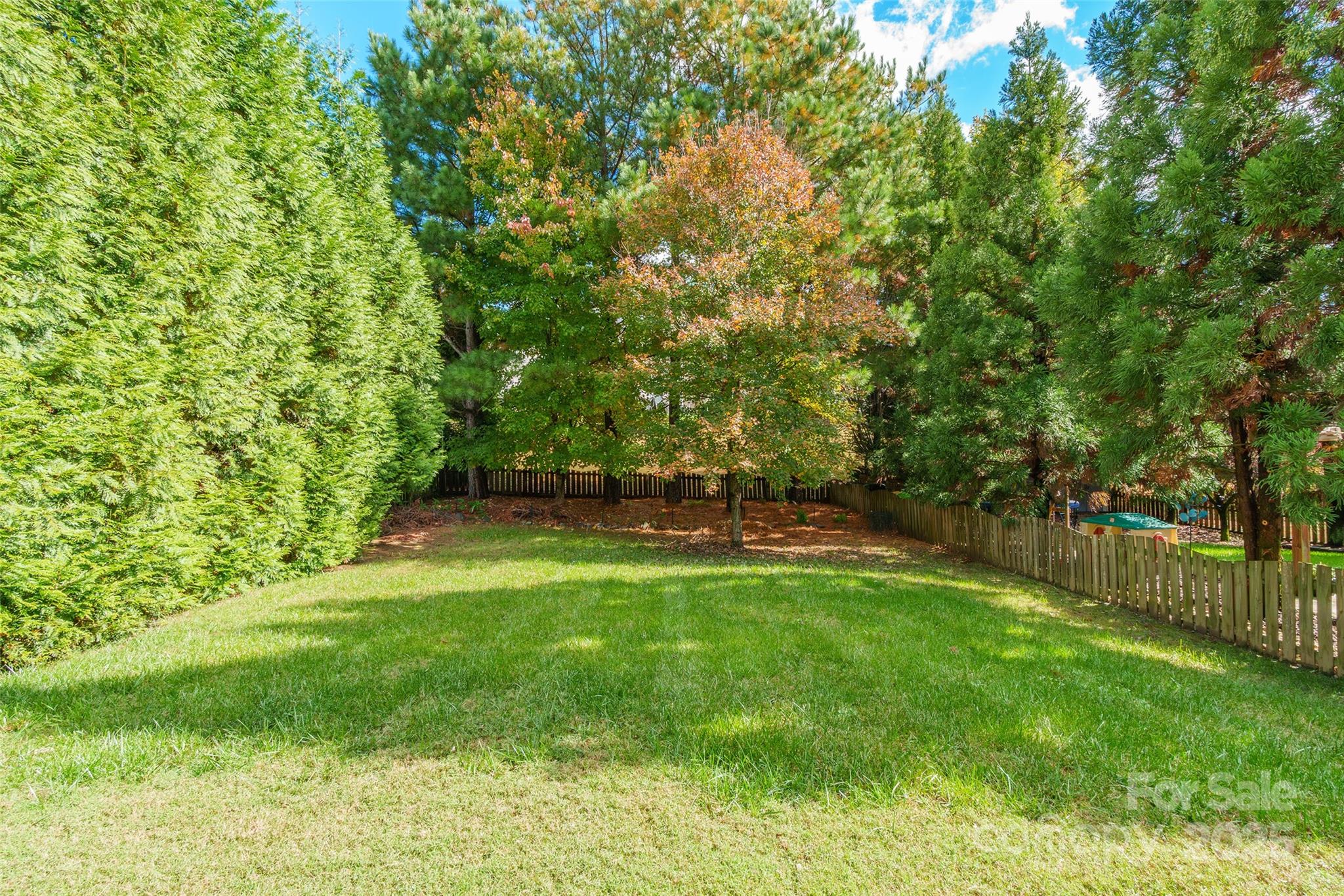 9312 Seamill Road Charlotte, NC 28278 - Photo 29 of 30 a view of green field with trees