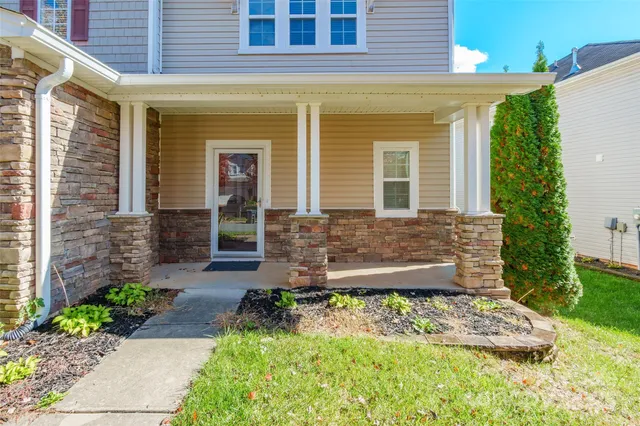 a front view of a house having yard