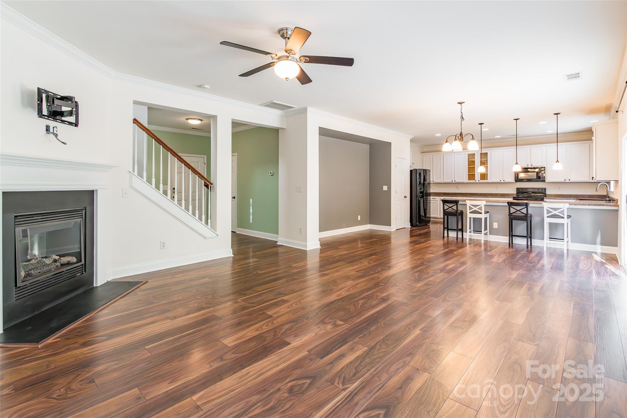 9312 Seamill Road Charlotte, NC 28278 - Photo 9 of 30 a view of a kitchen with furniture and a fireplace