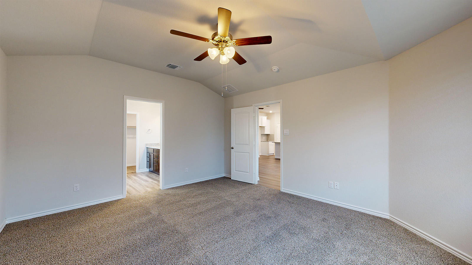 238 Water Wl Road Burnet, TX 78611 - Photo 12 of 33 Unfurnished bedroom featuring carpet flooring, lofted ceiling, and ceiling fan