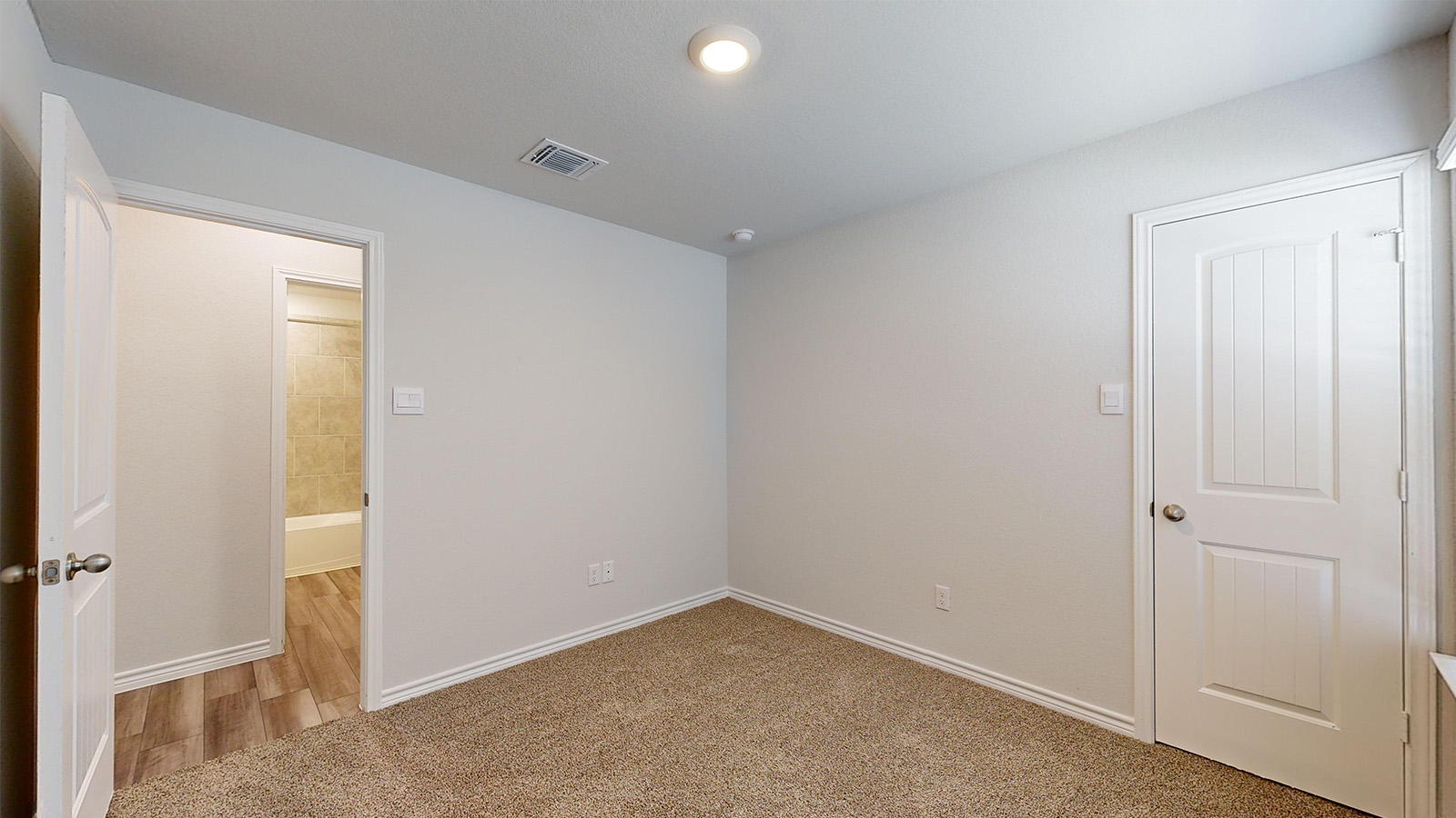 238 Water Wl Road Burnet, TX 78611 - Photo 19 of 33 Unfurnished bedroom with light carpet and baseboards