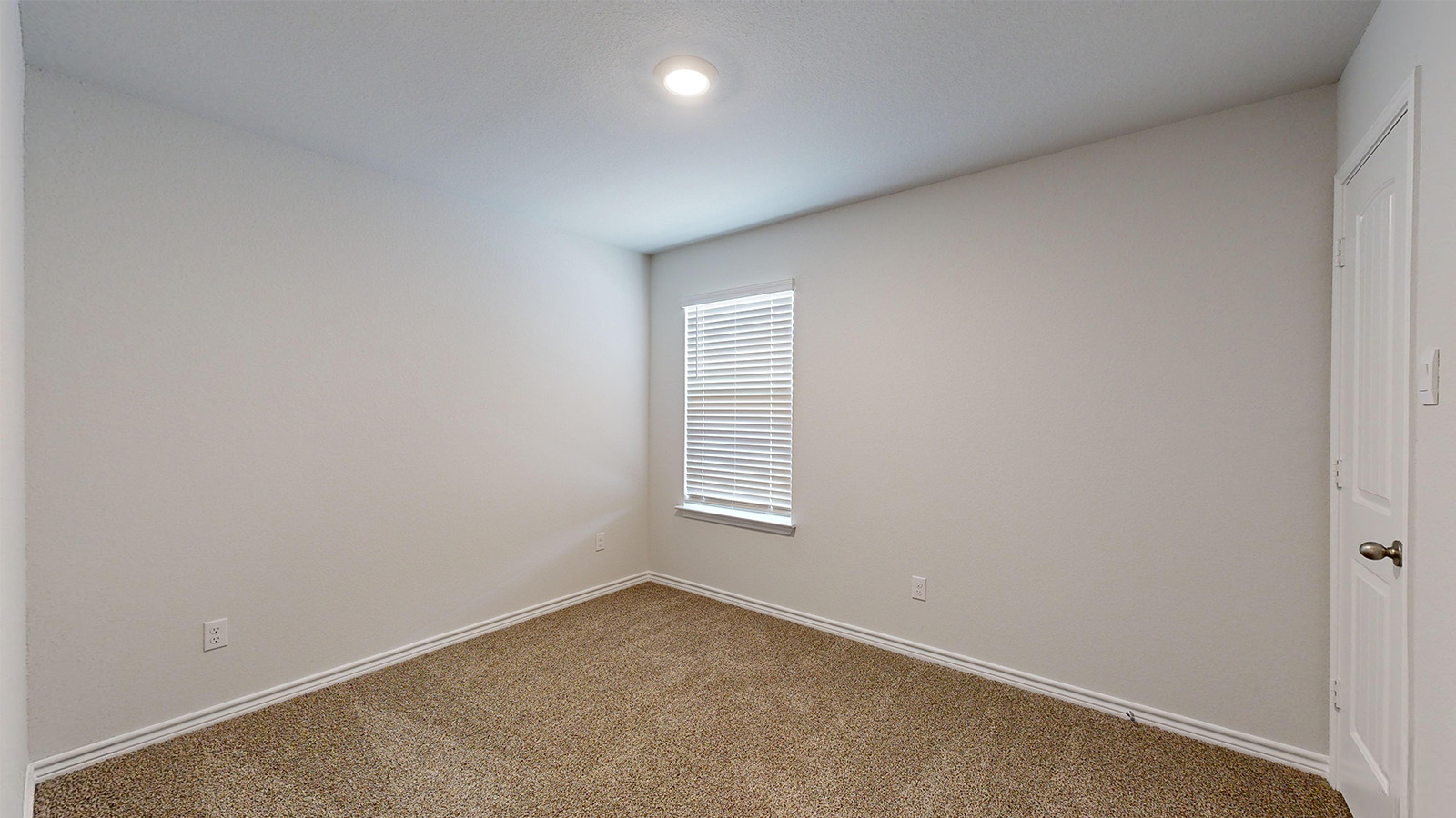 238 Water Wl Road Burnet, TX 78611 - Photo 20 of 33 Carpeted empty room featuring baseboards