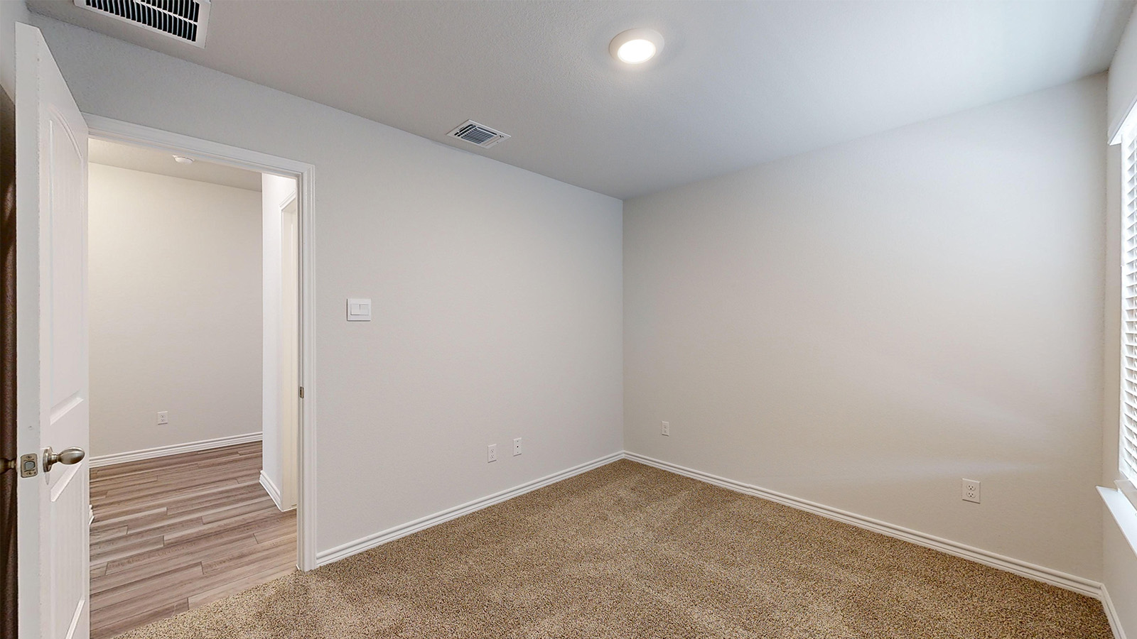 238 Water Wl Road Burnet, TX 78611 - Photo 21 of 33 Spare room with light carpet and baseboards