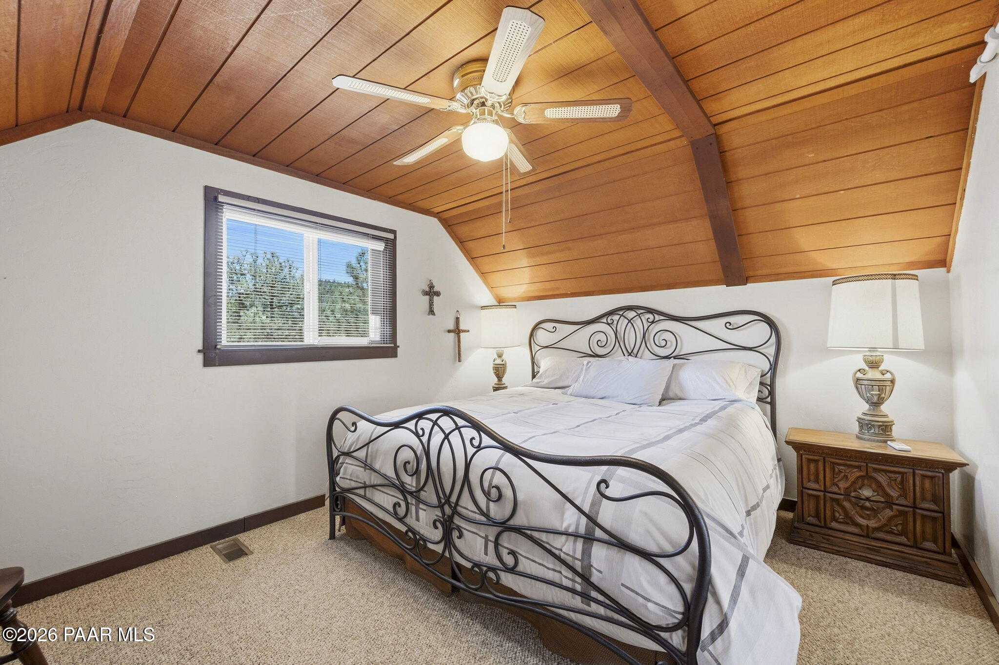 7251 South Big Bug Mesa Road Mayer, AZ 86333 - Photo 29 of 55 a bedroom with a bed and a window